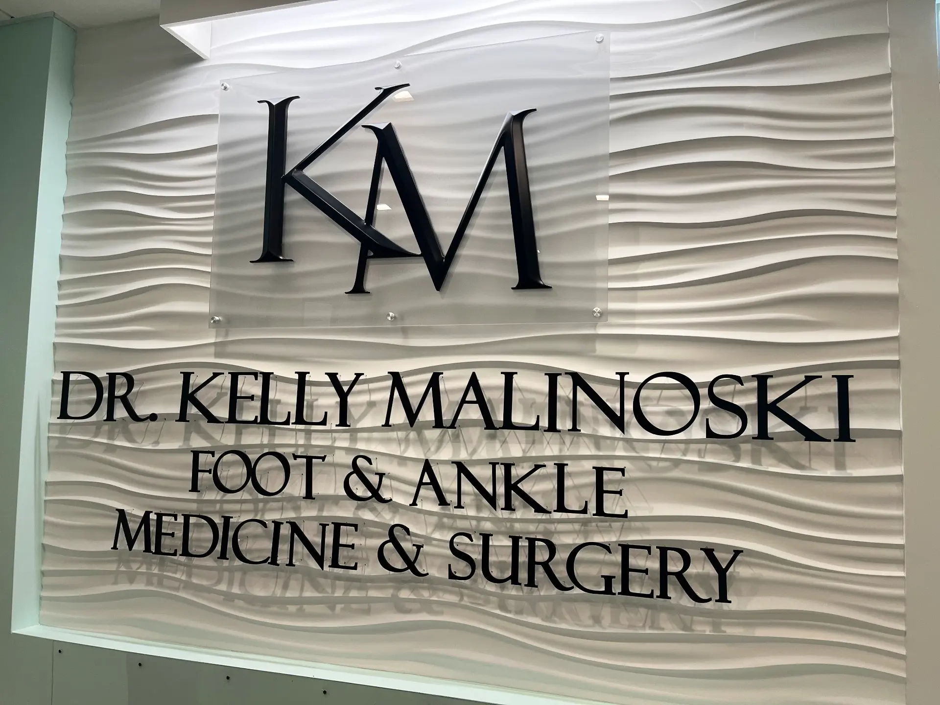 Dr. Kelly Malinoski podiatry office sign